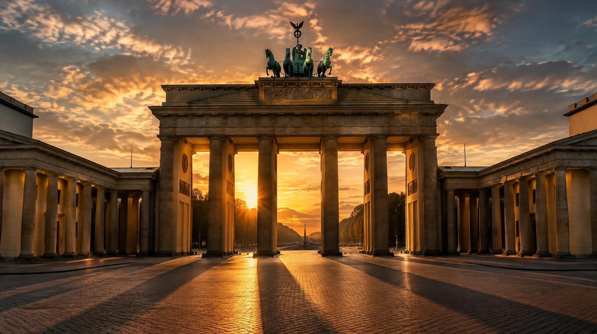 Brandenburg Gate in Berlin at dusk with dramatic lighting
